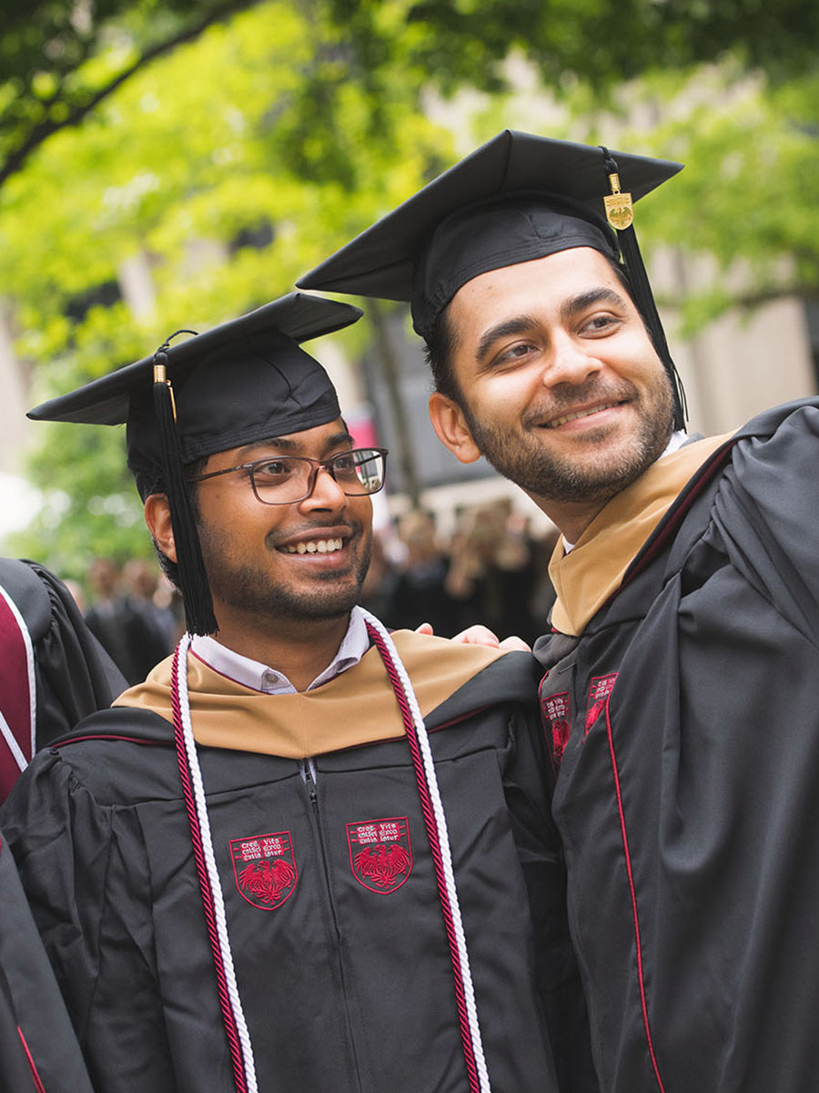 Two students at Convocation