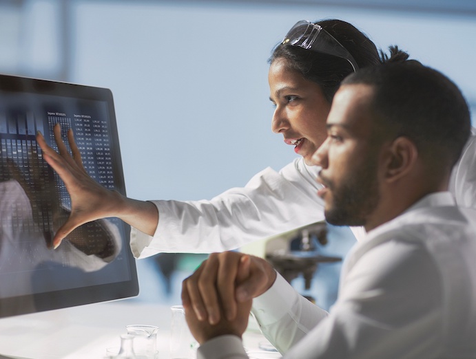 stock image doctors looking at screen