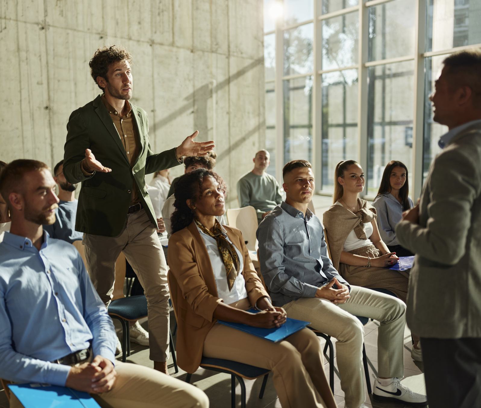Student standing and talking in a classroom