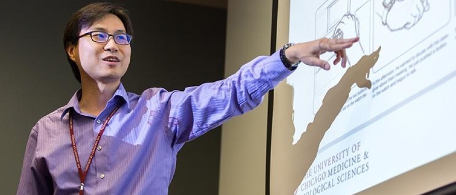man pointing at screen