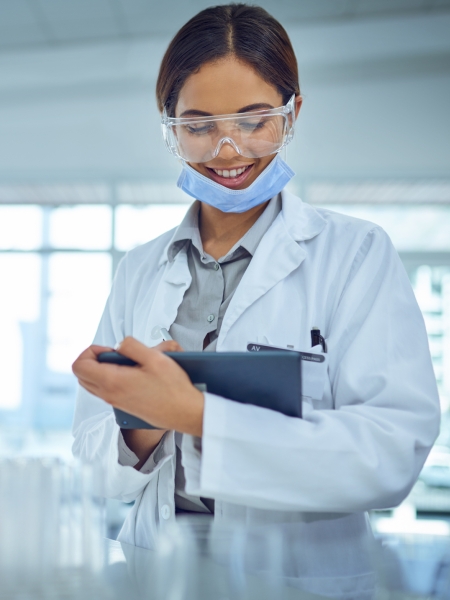 Shot of a female scientist using a digital tablet in a lab.