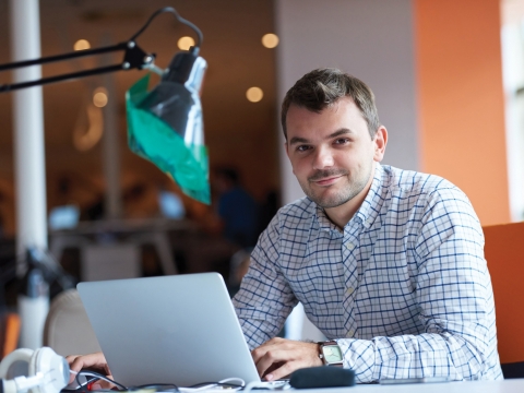 Man sitting at computer working