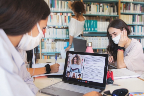 Students studying at a library.