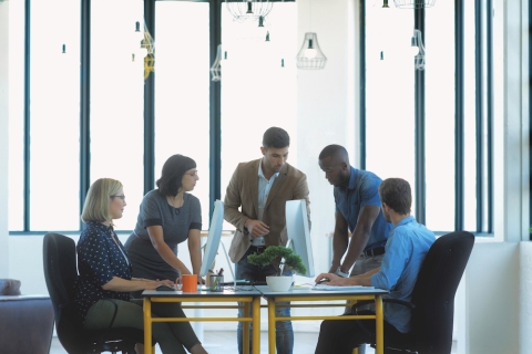 A meeting taking place in a conference room.