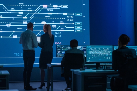 Big Screen Display Showing Infrastructure Infographics